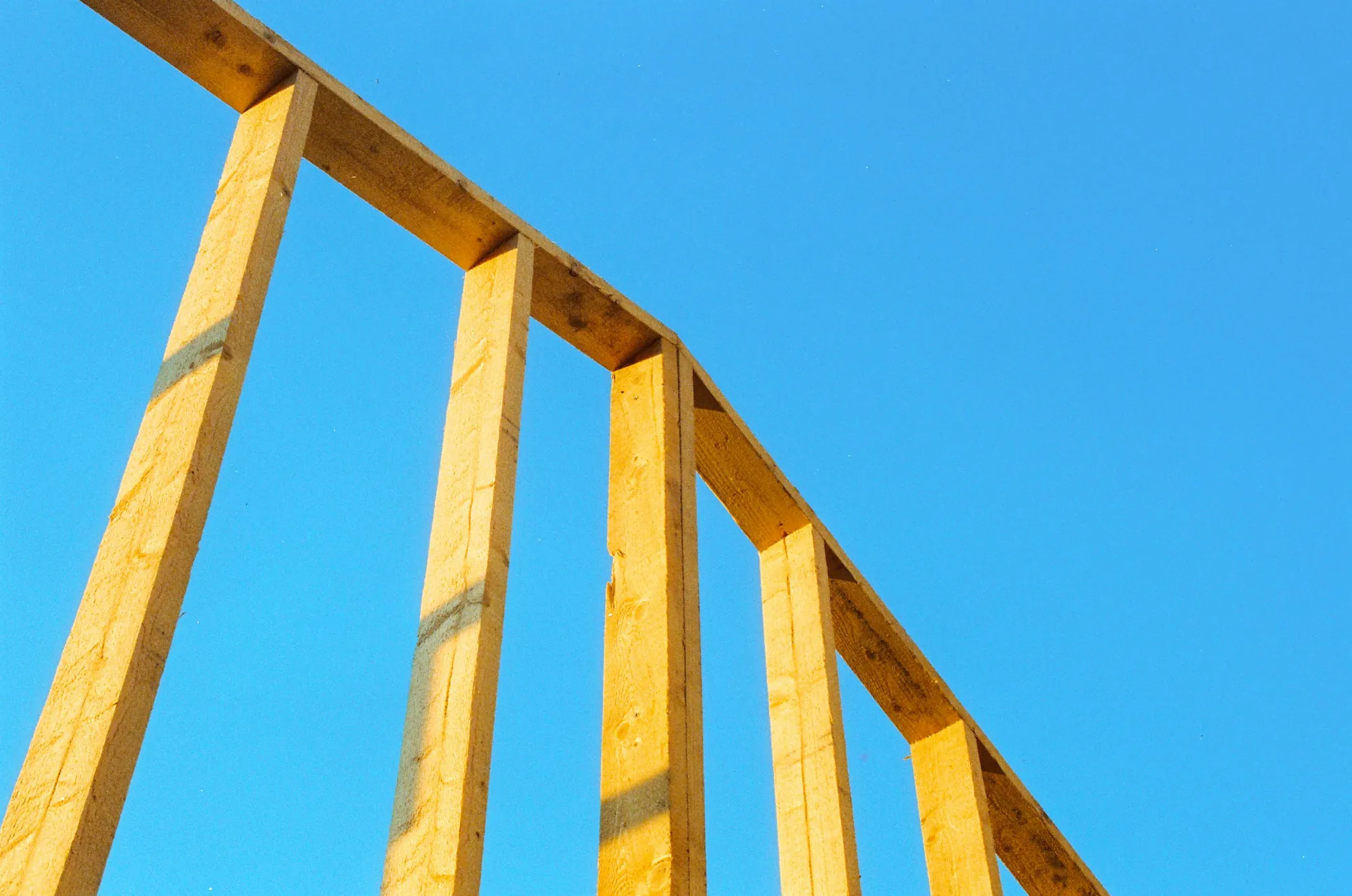 Wooden house frame under construction